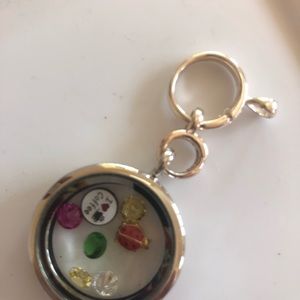 Floating charms and glass locket